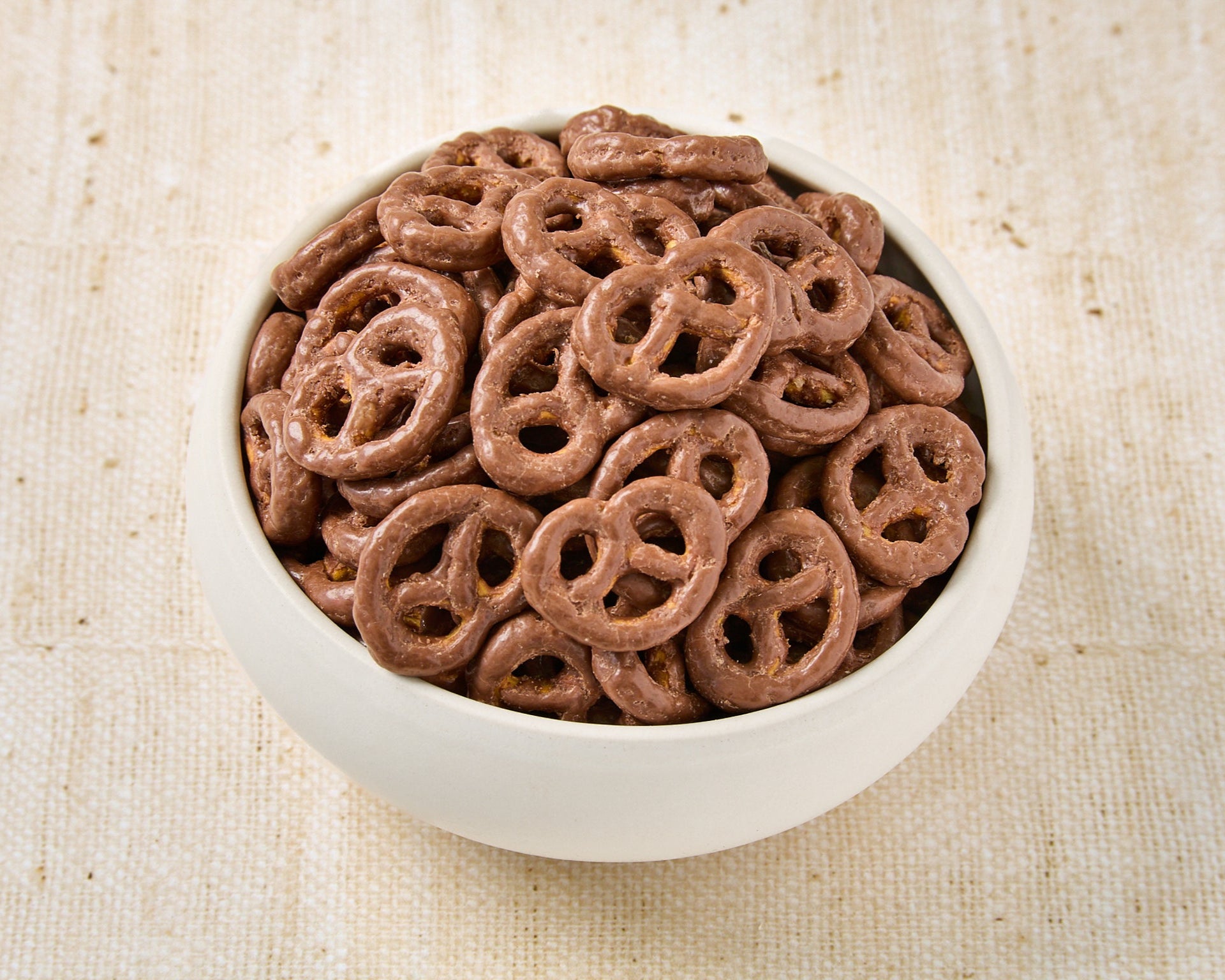 Pretzel bañado en chocolate con leche