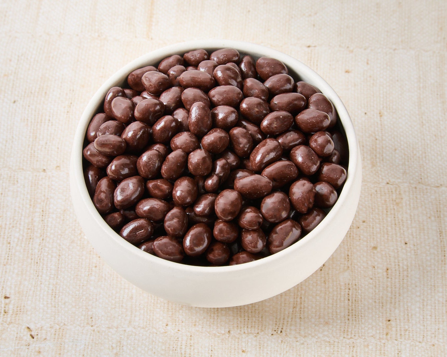Pistacho bañado en chocolate negro
